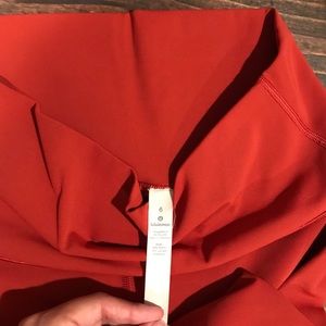 Size 6 Wunder Under Hi Rise Tight in Burnt Orange